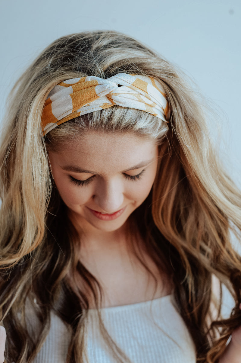 Yellow hairband with large ivory dots