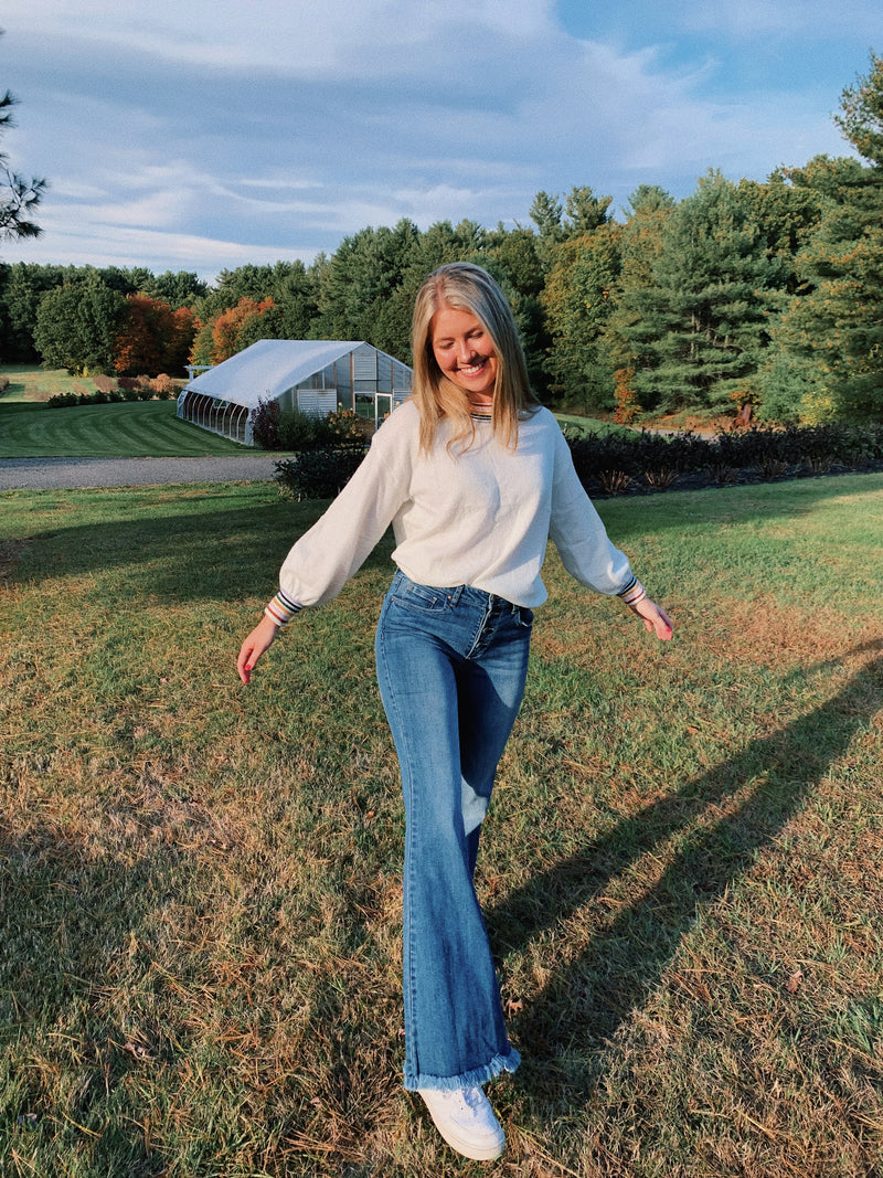 Mid-rise button down wide flair jeans